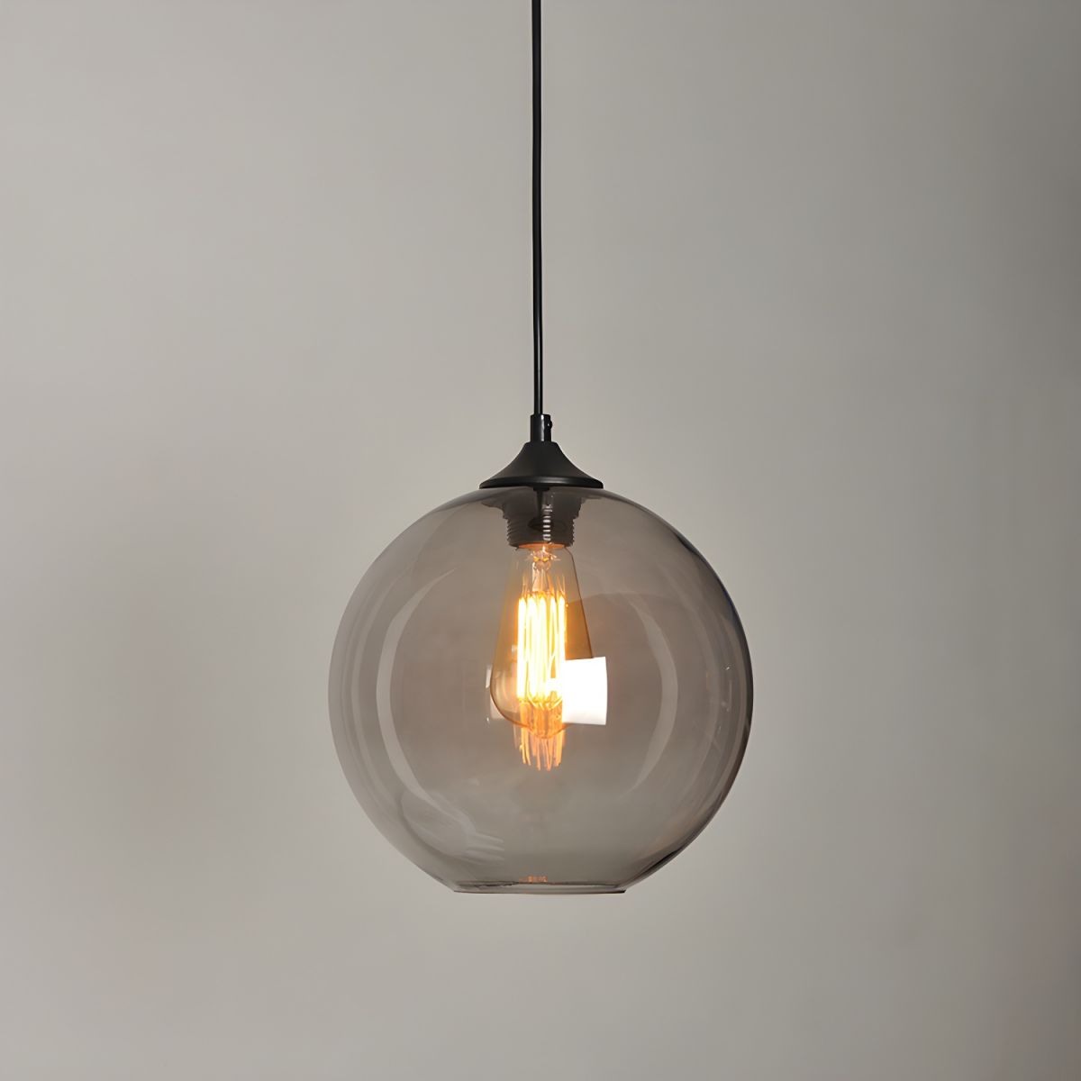 Suspension boule en verre coloré ou fumé