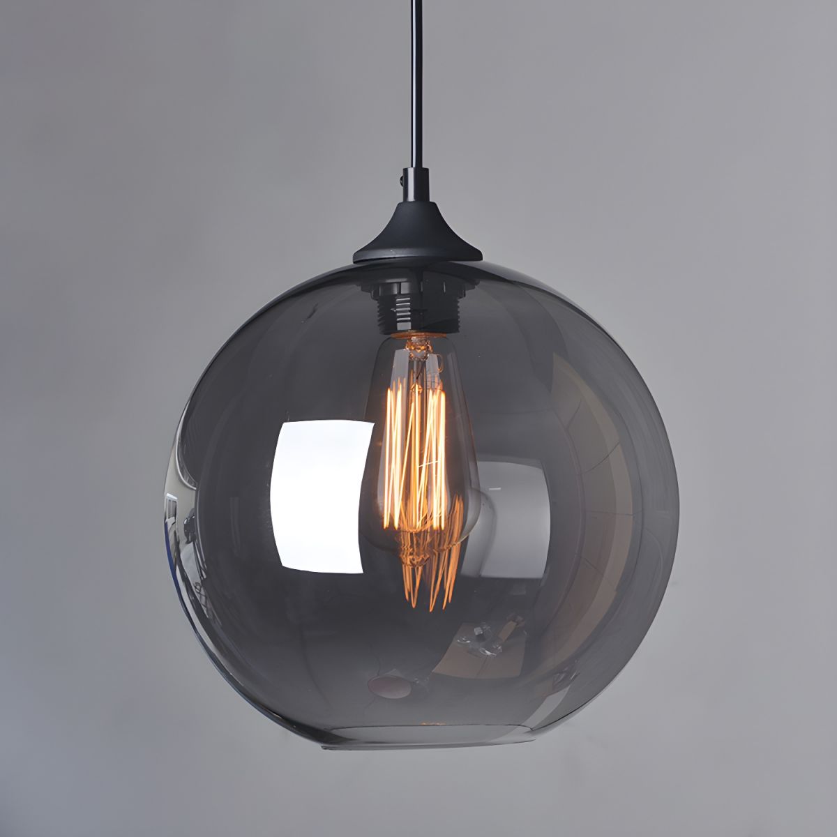 Suspension boule en verre coloré ou fumé