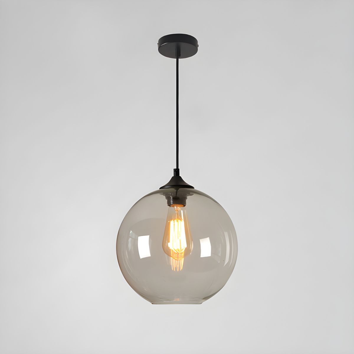 Suspension boule en verre coloré ou fumé