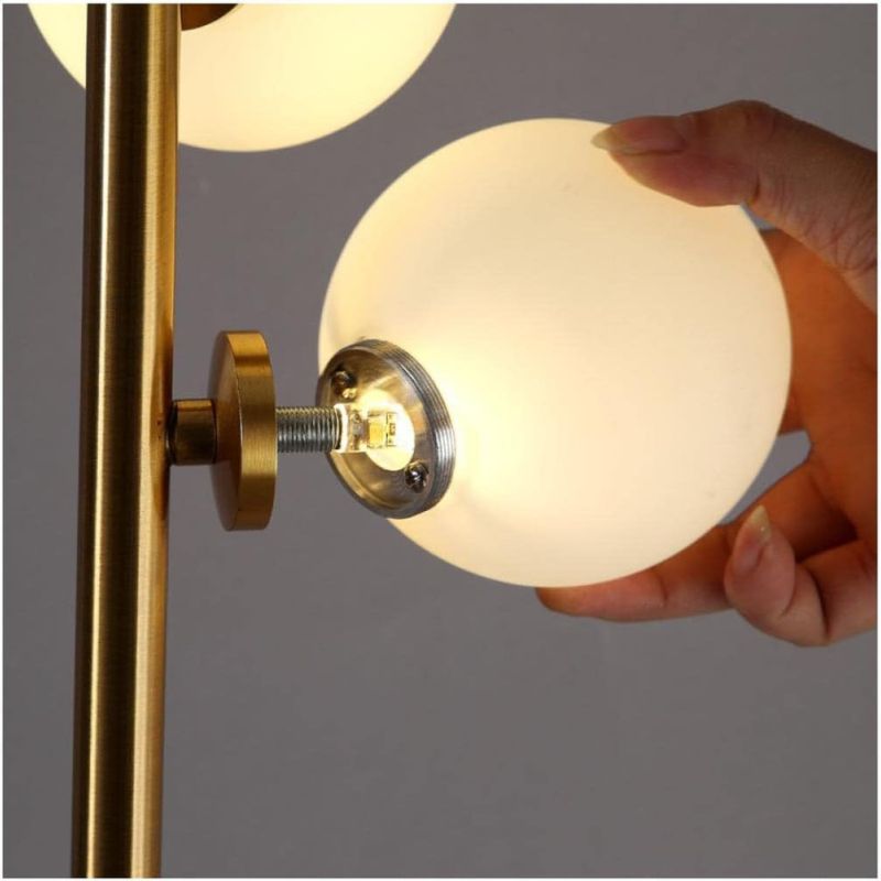Modern Gold LED Floor Lamp with Glass Sphere