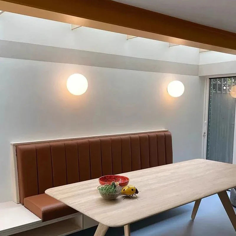 Modern White Glass Wall Sconce for Various Spaces