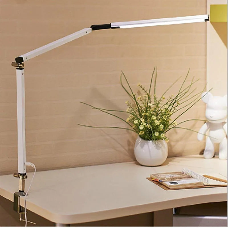 Creative LED Desk Lamp with Adjustable Arm and Dimming Feature