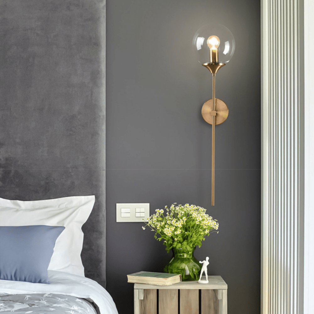Modern LED Wall Sconce with Gold Arm and Glass Globe Norenza