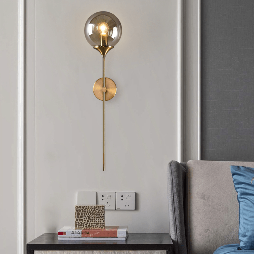 Modern LED Wall Sconce with Gold Arm and Glass Globe Norenza