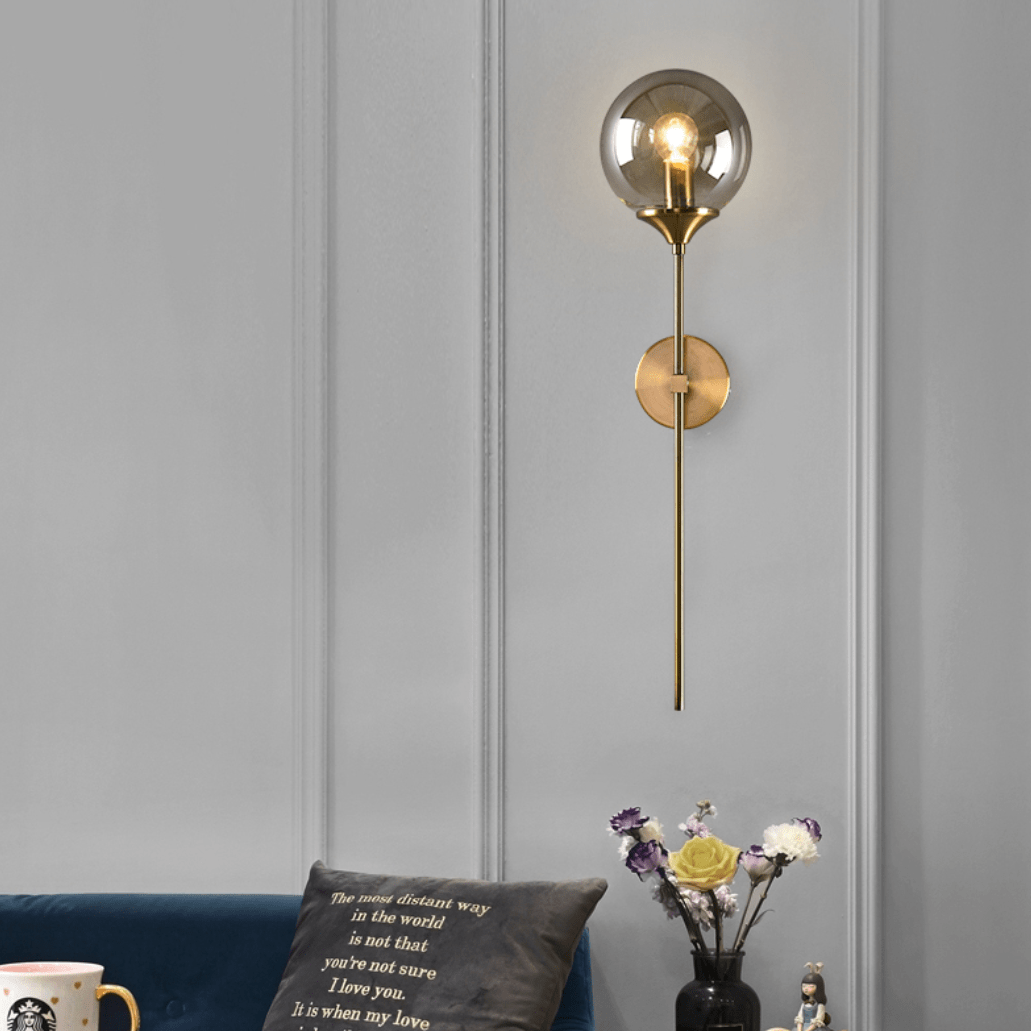 Modern LED Wall Sconce with Gold Arm and Glass Globe Norenza
