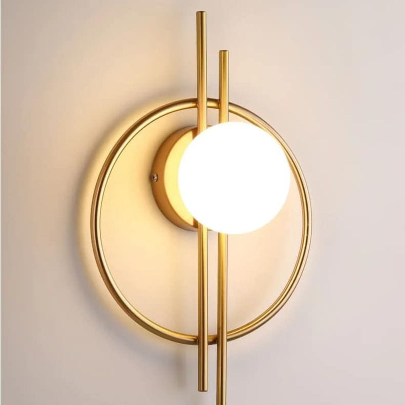 Modern Round Metal Wall Sconce Harlow gold Norenza