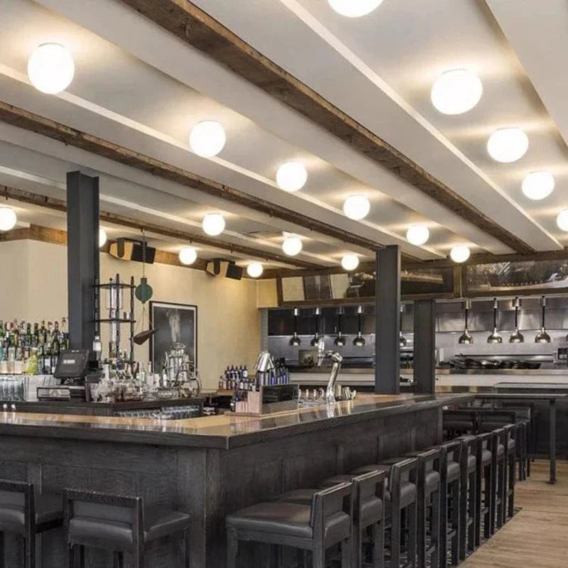 Modern White Glass Wall Sconce for Various Spaces Norenza