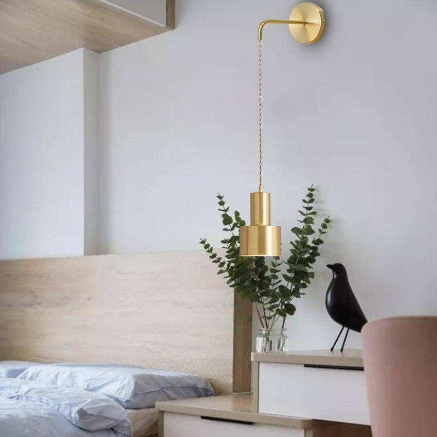 Gold Wall Sconce with Hanging Light Fixture
