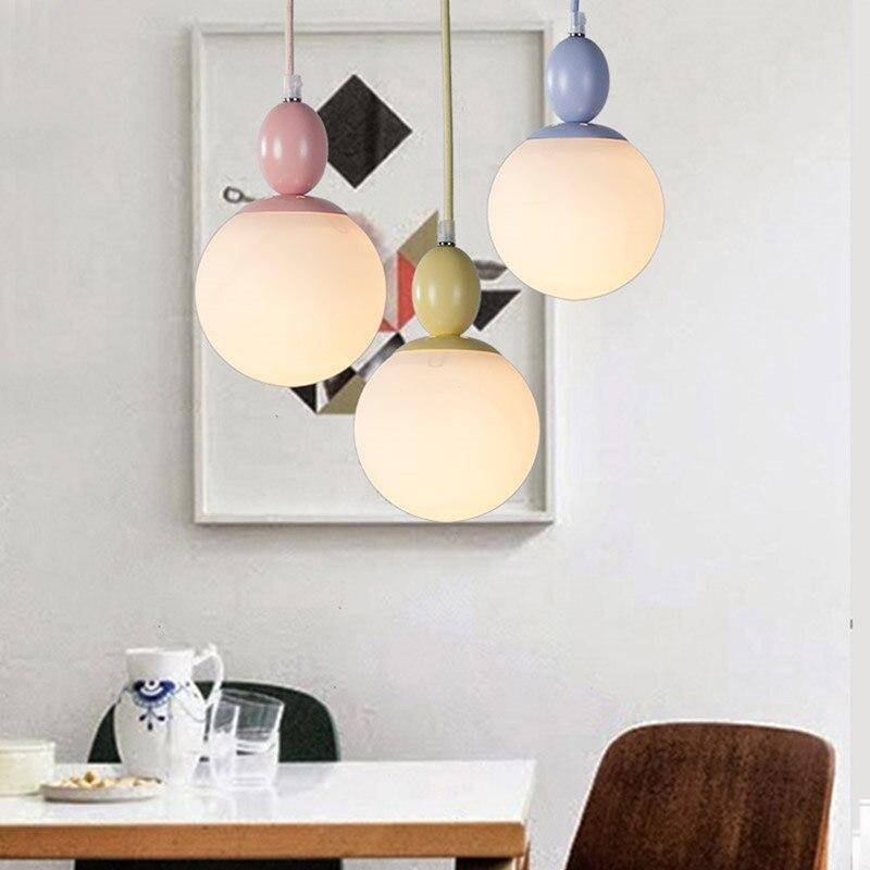 Colorful Suspension with Perched Bird Macaroon