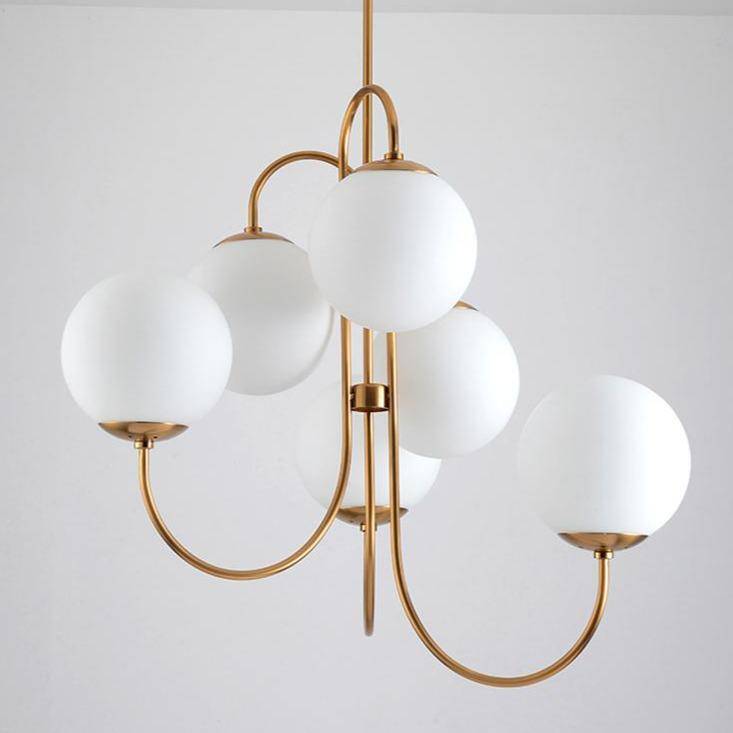 Elegant Chandelier with Golden Branches and Glass Globe